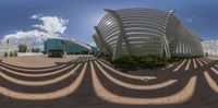 an empty building is seen in this fisheye photograph it looks like it could be painted white