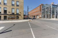 an empty street with a sign that says'go ahead'in front of it