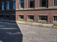 this is a view of an urban street from a low perspective with a man walking