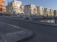 an area where people have their skateboards parked on the curb in front of them