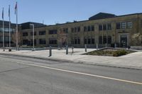 a yellow line is on a road in front of an old building with buildings on both sides