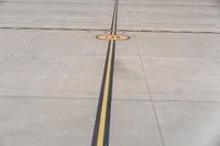 the plane has a few markings on the road to make it look like it's taking off