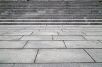 steps leading to an empty building and tiled flooring surface area for use as a background
