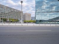 empty road in city area with modern building in the background for image, urban landscape