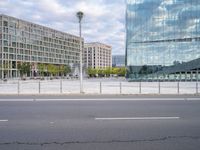 empty road in city area with modern building in the background for image, urban landscape