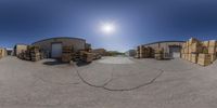 a photo of a panoramic view of a large warehouse full of boxes and crates