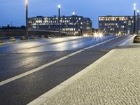 Urban Water Reflections: Rainy Night in Berlin