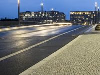 Urban Water Reflections: Rainy Night in Berlin