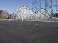 the amusement park has an elaborate roller coasterer theme on it's track and a roller coaster coaster