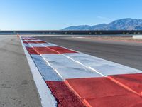 USA Asphalt Road: Speeding Through a Clear Sky