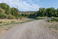 USA Colorado: Straight Road in Antonito Along Conejos River 001