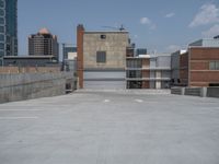 a parking lot and wall are pictured in a photo from the perspective point of view