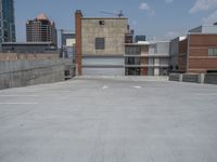 a parking lot and wall are pictured in a photo from the perspective point of view