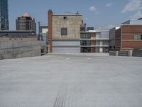 a parking lot and wall are pictured in a photo from the perspective point of view