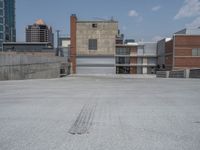 a parking lot and wall are pictured in a photo from the perspective point of view