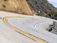 USA's Desert Landscape: A Mountain Pass with Asphalt Road