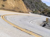 USA's Desert Landscape: A Mountain Pass with Asphalt Road