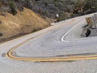 USA's Desert Landscape: A Mountain Pass with Asphalt Road