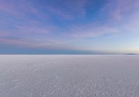 the vast expanse of land that is mostly barren and looks like a frozen sea of water