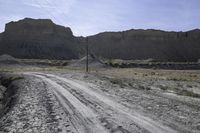 USA Dirt Road with Mountain and Clear Sky