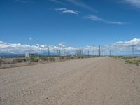 USA: A Dirt Road Leading to a Power Plant in Nature