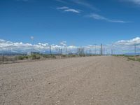 USA: A Dirt Road Leading to a Power Plant in Nature