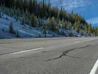 USA's Forested Mountain Road: Covered in Snow