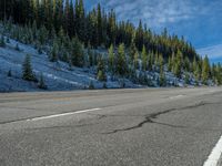 USA's Forested Mountain Road: Covered in Snow