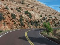 USA Landscape: Road on a Clear Day with Majestic Mountains