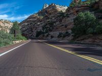 USA Landscape: Road Through Mountains and Clouds