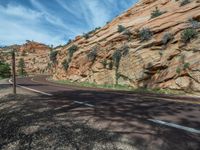 USA National Park: Road Surrounded by Mountains and Clouds