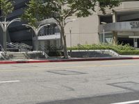 a street view of an outside business, and stairs leading to a building and steps