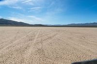 the desert is dirty and it looks as if it are going down a mountain