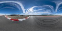 a person is riding on a motorcycle through some curves in the air on a race track