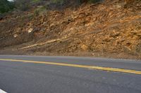 USA Road Through Asphalt Mountain Landscape