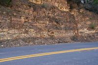 USA Road Through Asphalt Mountain Landscape