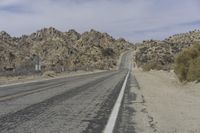 USA Road: Asphalt Lined with Mountains