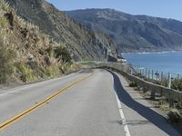 USA Road: Asphalt Through a Mountain Range