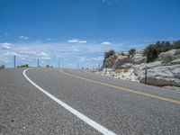 USA Road: Exploring the Head of the Rocks Under a Clear Sky