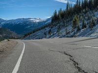 USA Road: A Quarter Covered in Snow with Majestic Mountain Landscape