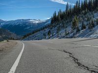 USA Road: A Quarter Covered in Snow with Majestic Mountain Landscape