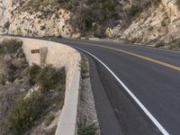 USA's Rugged Landscape: Highway through a Mountain Pass