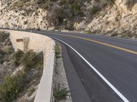 USA's Rugged Landscape: Highway through a Mountain Pass