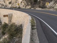 USA's Rugged Landscape: Highway through a Mountain Pass