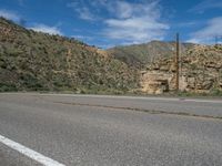 USA Scenic Drive: Mountain Road with Dramatic Clouds