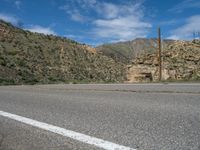 USA Scenic Drive: Mountain Road with Dramatic Clouds