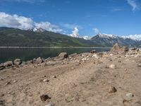 Scenic View in the USA: A Lake Surrounded by Mountains and Clouds