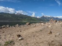 Scenic View in the USA: A Lake Surrounded by Mountains and Clouds