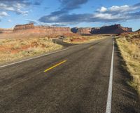 there is a desert road that stretches across the earth for many miles and it is empty