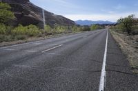 USA Utah: Deserted Road in Red Rock Landscape